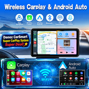 Car dashboard with a navigation system displaying Carplay and Android Auto interfaces.