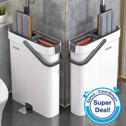 White cleaning caddy with gray mops and red brushes in a bathroom setting