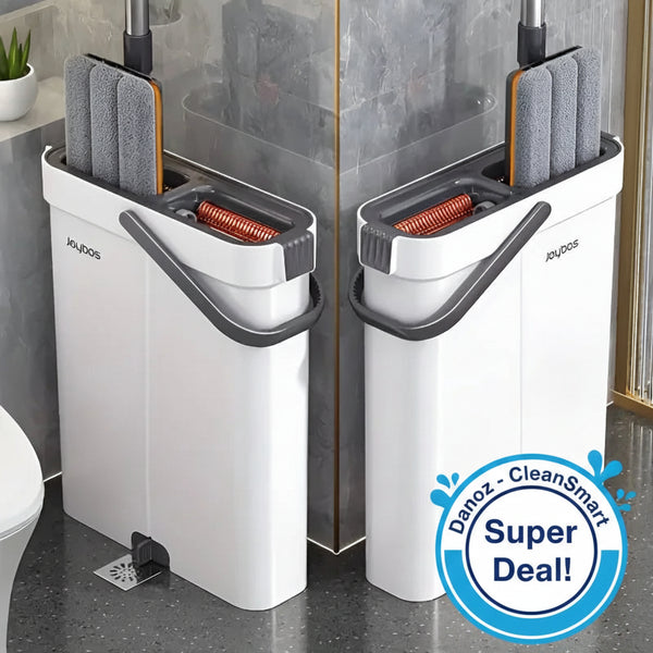 White cleaning caddy with gray mops and red brushes in a bathroom setting