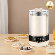 Modern kitchen soup maker appliance on a wooden table with text on a beige background