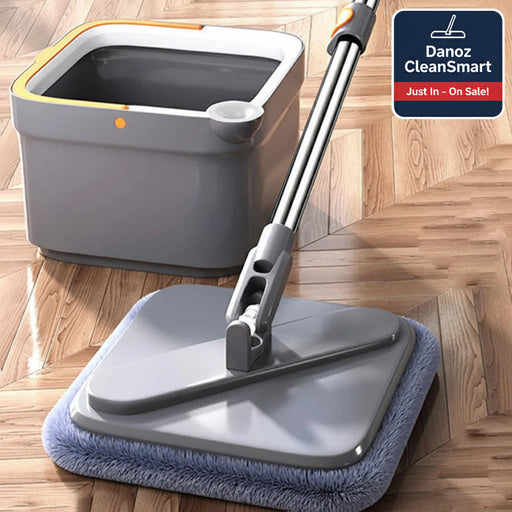Mop and bucket set on a wooden floor