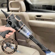 A handheld wireless vacuum cleaner being used to clean the interior of a car, displaying its compact and cordless design.