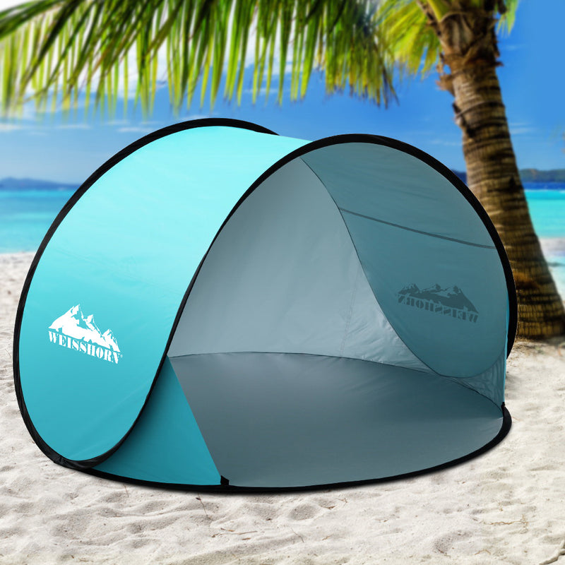Ultimate convenience and protection with Danoz Direct - Weisshorn Pop Up Beach Tent. This portable sun shade shelter is perfect for camping