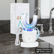 White teeth whitening device with blue light and packaging on a white background