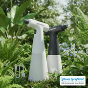 Greenworks handheld steamer with USB cable on a white background