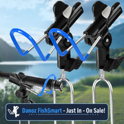 Metal clamps with blue accents on a blurred natural background