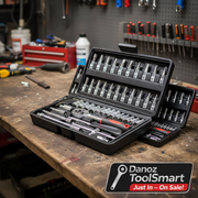 Open tool kit with various tools including sockets and wrenches on a white background