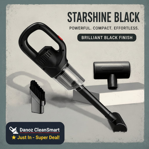 A cordless handheld vacuum cleaner in starshine black with two attachments, shown on a textured light gray background with promotional text reading 'STARSHINE BLACK' and 'BRILLIANT BLACK FINISH'.