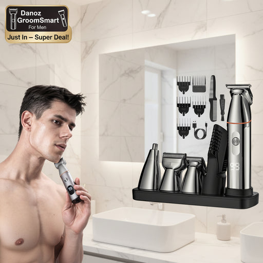 A silver and black cordless beard trimmer set with multiple attachments, a comb, and a charging base, shown alongside a shirtless man holding the trimmer. The background is solid white.