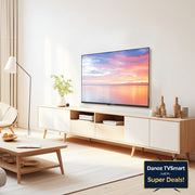 A modern living room scene featuring a light wood and white media console with a television mounted above it, styled with a floor lamp, coffee table, and decorative vases.