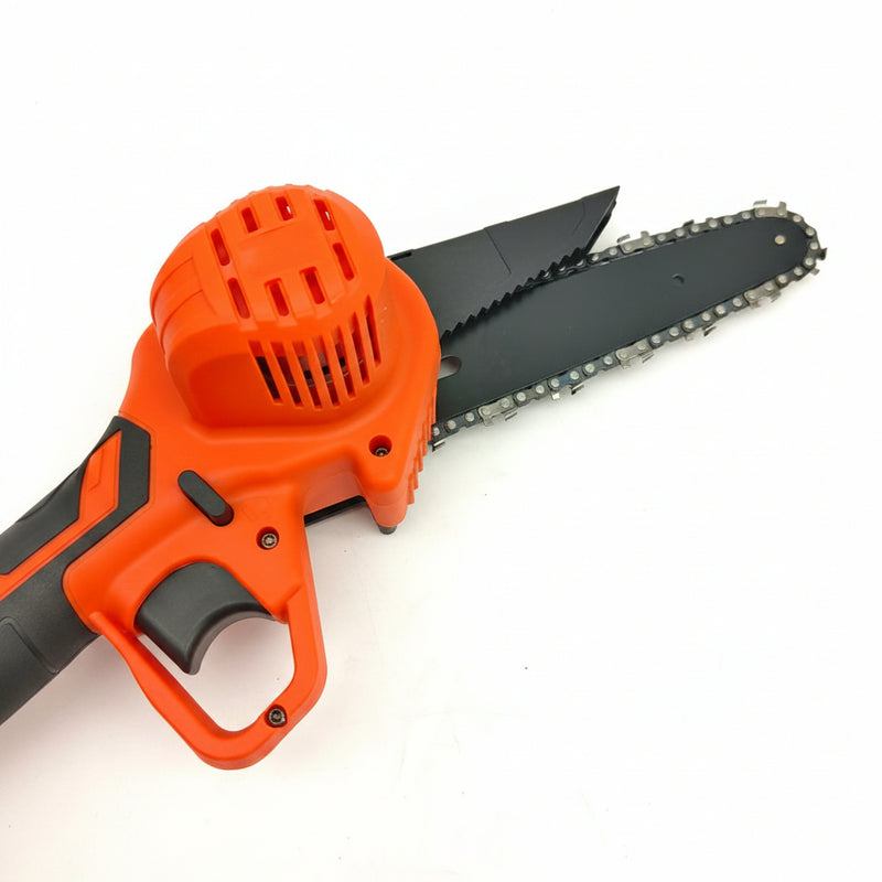 Orange and black chainsaw on a white background