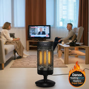 Two people sitting on a couch in a living room with a heater and TV.