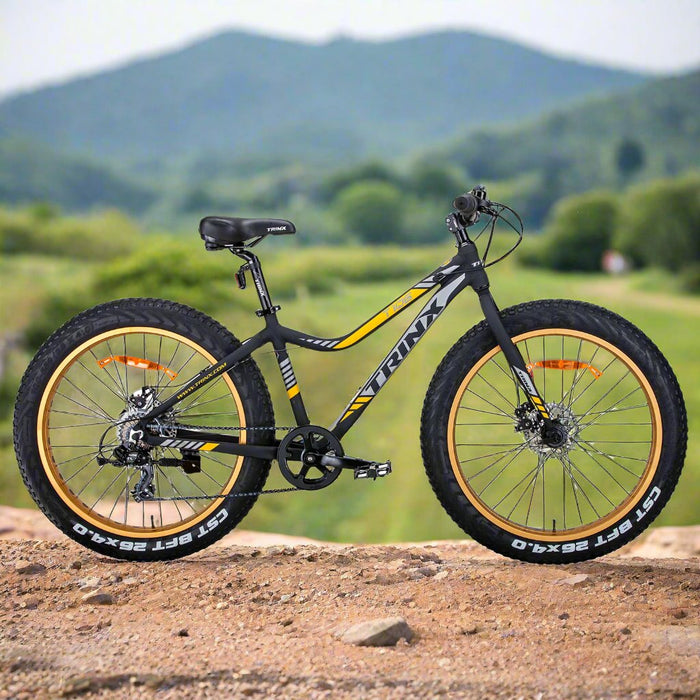 Danoz Sports and Fitness 🚴‍♂️🏋️ Trinx Tiger T106 Fat Bike Shimano 7 Speed Bicycle Orange - Incl. Delivery