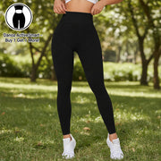 Person wearing black leggings on a white background