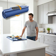 Blue portable kitchen setup with food and a roll-up table on a white background