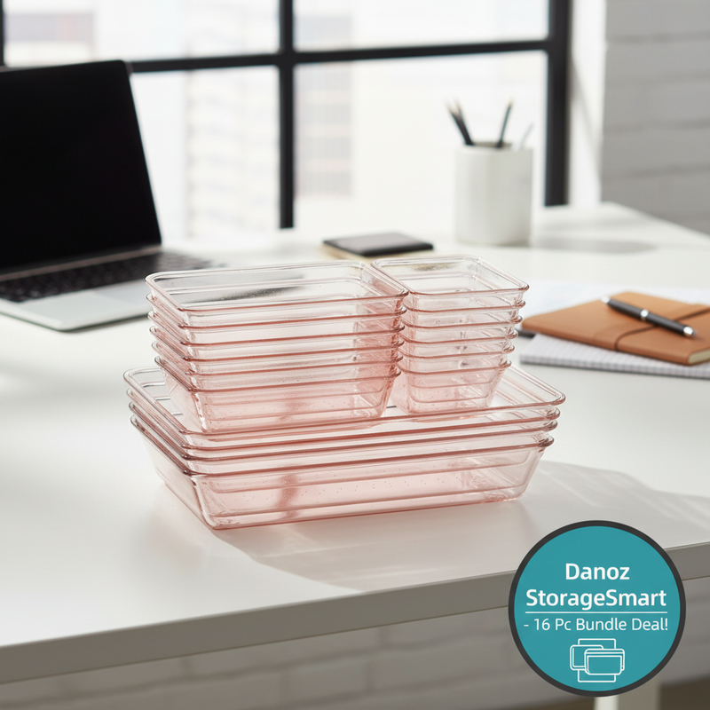 Pink 16-piece set of glass containers on a gray background