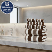 Stack of brown and white striped towels on a white background