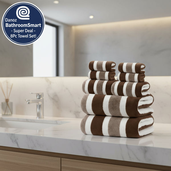 Stack of brown and white striped towels on a white background