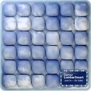 Marble-patterned lumbar cushion with blue and white cubes.