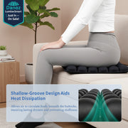 Person sitting on a black gel seat cushion with text explaining its design.