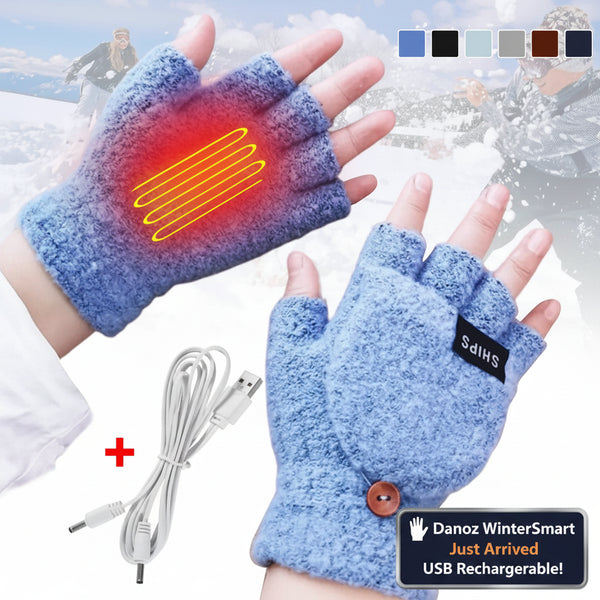 Blue heated gloves with USB cable on a snowy background