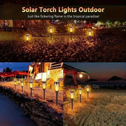 Bring a magical glow to your garden with Danoz Lights! These 12LED solar flame torch lights flicker like real flames, creating a cozy, enchanting atmosphere - Buy 1 Get 1 Free! - danozdirect