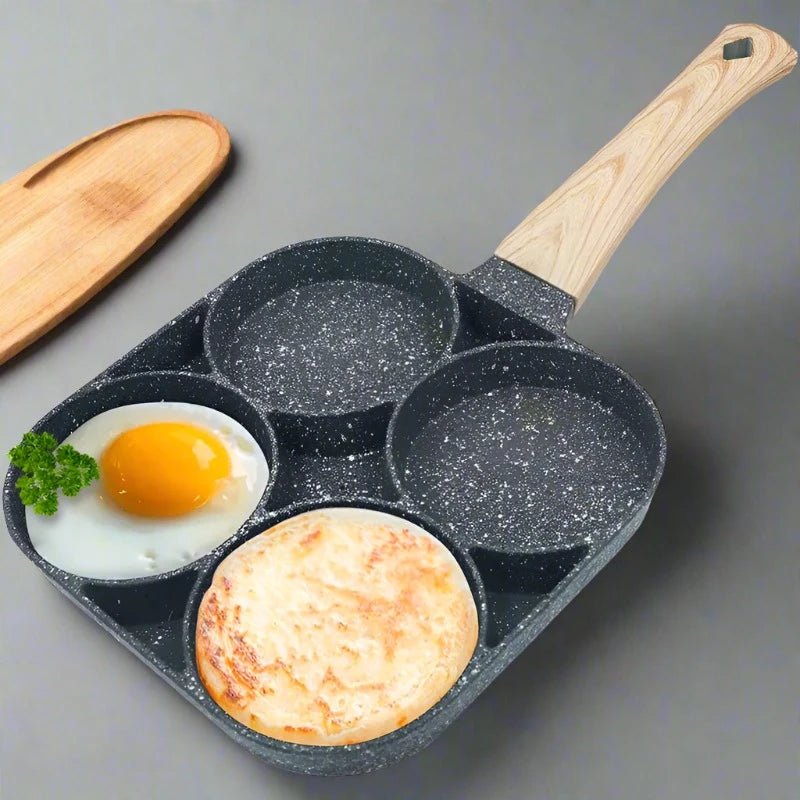Danoz Cookware🍳🧑‍🍳 EggMate Frying Pan - perfect for cooking pancakes and eggs with its nonstick surface and 4 - cup design - danozdirect