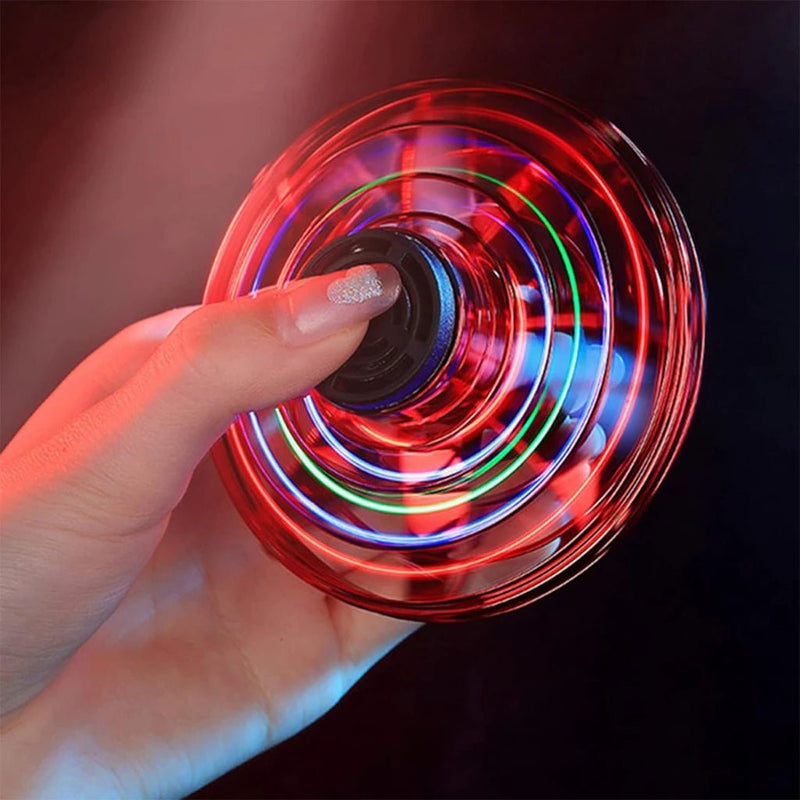 Danoz Kids - Watch kids eyes light up as this LED - powered flying UFO spinner takes flight! Featuring advanced gyro technology, it hovers and spins with mesmerizing precision, Buy 1 Get 1 Free! - danozdirect