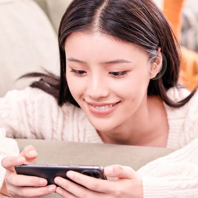 Get comfort and freedom with the Exclusive Danoz Direct Mini Bluetooth Headset. With 5.3 Invisible Earbuds! Available colors - Skin, Black and White. - danozdirect