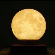 Illuminate your space with Danoz Levitating Moon Lamp, captivating night light that floats effortlessly above its base using magnetic levitation technology. - danozdirect