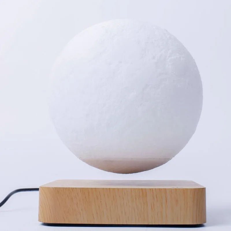 Illuminate your space with Danoz Levitating Moon Lamp, captivating night light that floats effortlessly above its base using magnetic levitation technology. - danozdirect