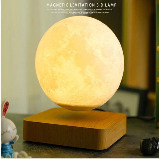 Illuminate your space with Danoz Levitating Moon Lamp, captivating night light that floats effortlessly above its base using magnetic levitation technology. - danozdirect