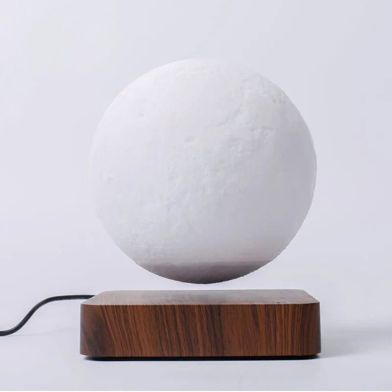 Illuminate your space with Danoz Levitating Moon Lamp, captivating night light that floats effortlessly above its base using magnetic levitation technology. - danozdirect
