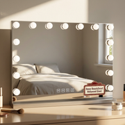 Silver Hollywood mirror front view in warm bedroom