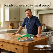 Man preparing dinner with green KniveSmart manual sharpener on a kitchen island