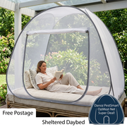 OziMozi mosquito net on a sheltered verandah daybed