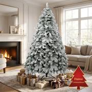 Snow-flocked 2.4m fir Christmas tree in bright living room