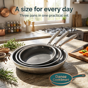 Three Danoz CookSmart stainless steel honeycomb pans nested on a kitchen worktop