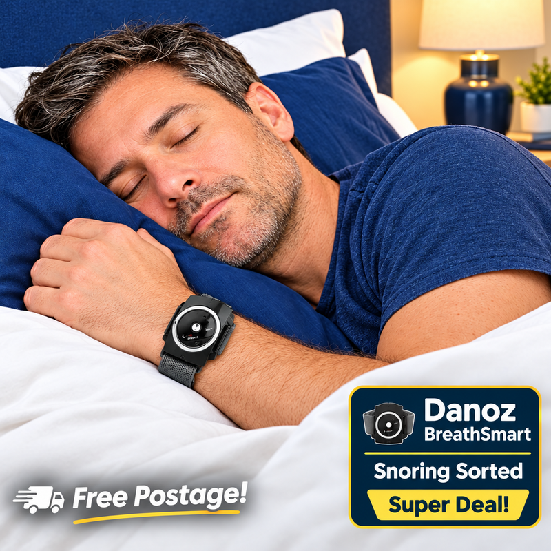 Adult man asleep wearing BreathSmart wristband in bedroom
