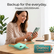 Woman charging a smartphone with a Green 200,000mAh PowerSmart power bank
