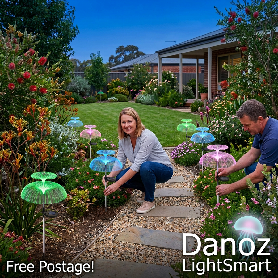 Adults installing Danoz LightSmart solar jellyfish lights in a real garden