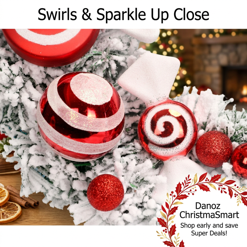 Close-up of striped baubles spiral ornaments and frosted wreath foliage