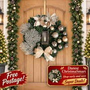 Champagne Christmas wreath on doorway with Free Postage bottom left
