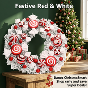 Red and white candy-style wreath with frosted foliage on an oak console