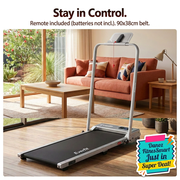 Treadmill and remote in cream-wall living room