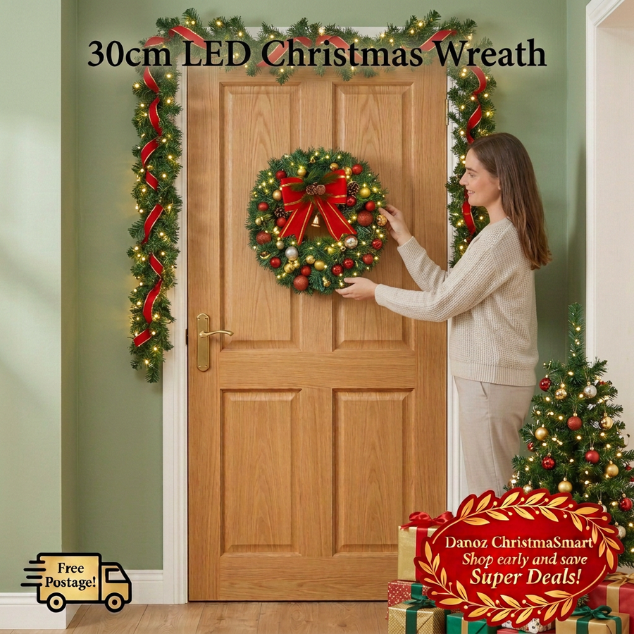 Woman arranging an LED Christmas wreath in a festive entryway with garland, tree and presents, Free Postage