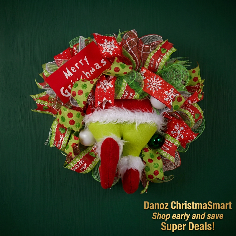Red and green Christmas ribbon wreath with plush legs against a dark green wall