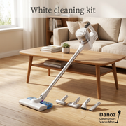 White Danoz CleanSmart vacuum and cleaning attachments in a living room