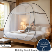 OziMozi mosquito net on a holiday guest-room bed