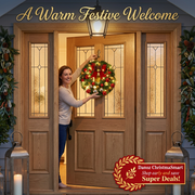 Woman hanging a lit Christmas wreath on an oak doorway at dusk